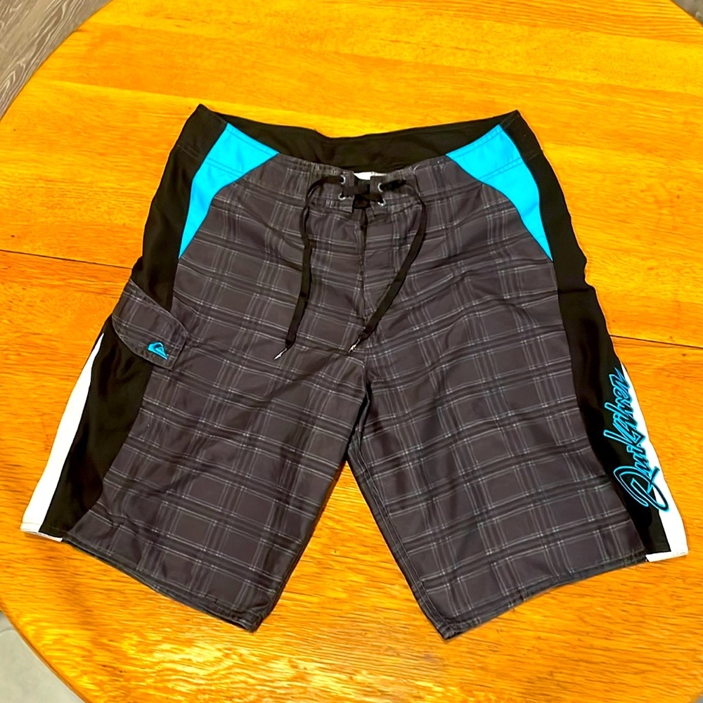 Quicksilver board shorts, unlined, men’s 34, brown plaid with blue and black.
